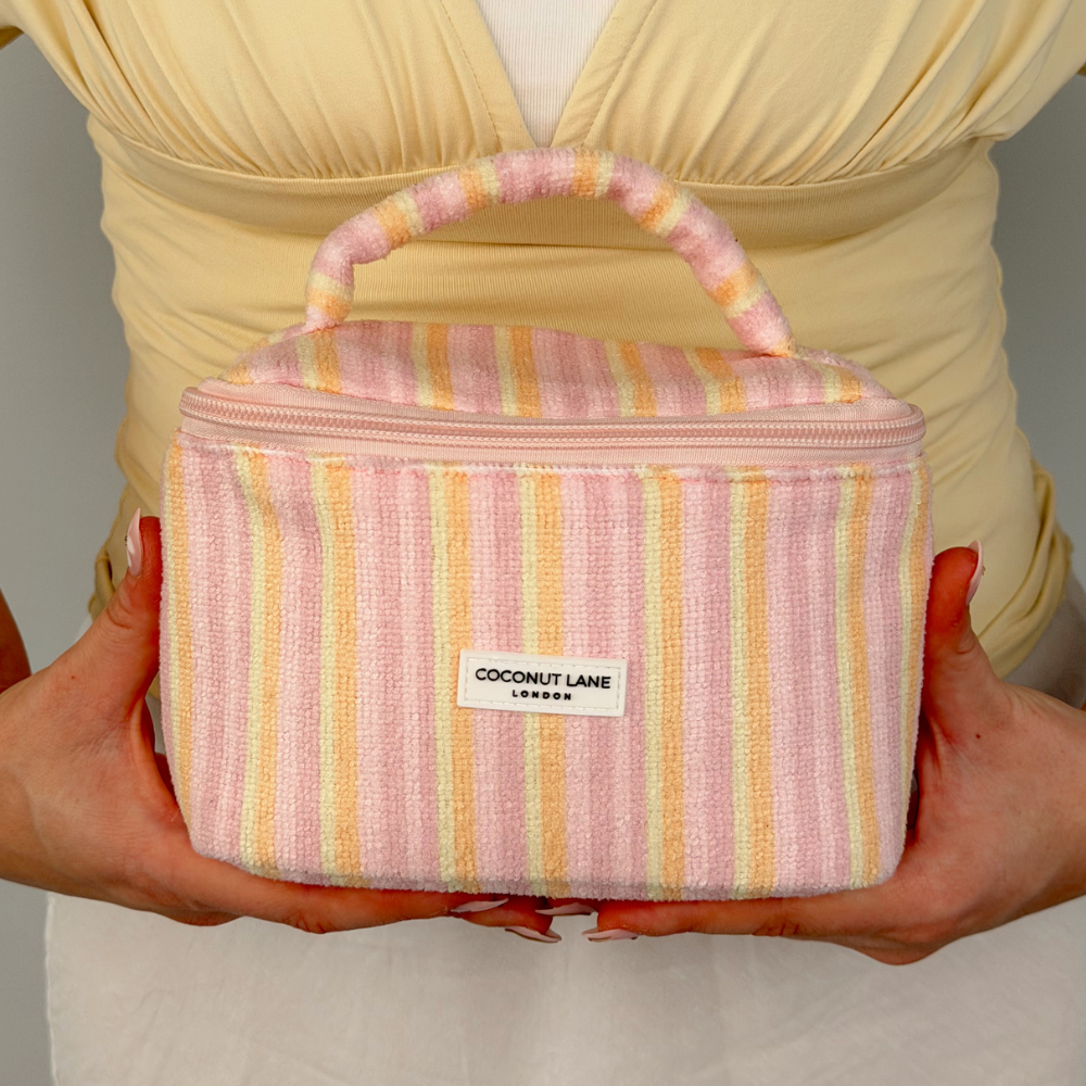 Close up of girl holding Mini Vanity Case-Pastel Stripes