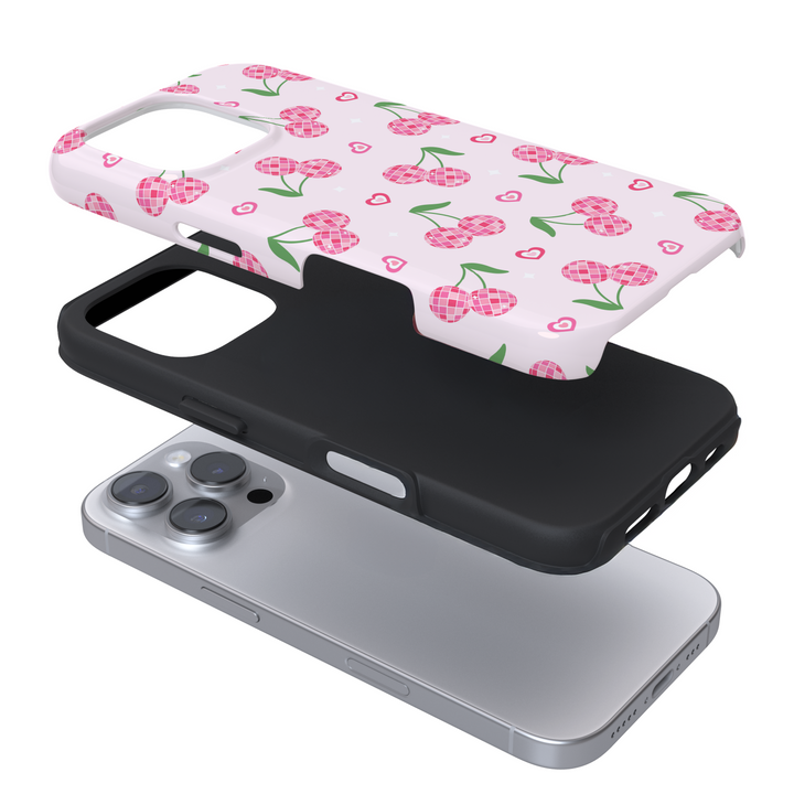 Expanded view of a pink phone case with a cherry pattern on a white background
