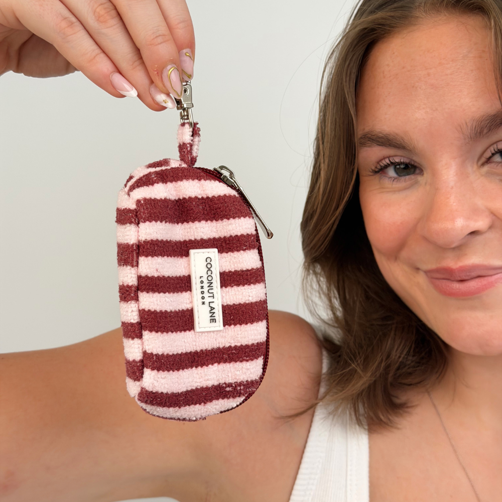 Girl holding mini bag with keyring
