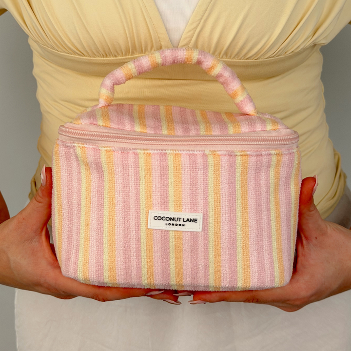 Close up of girl holding Mini Vanity Case-Pastel Stripes