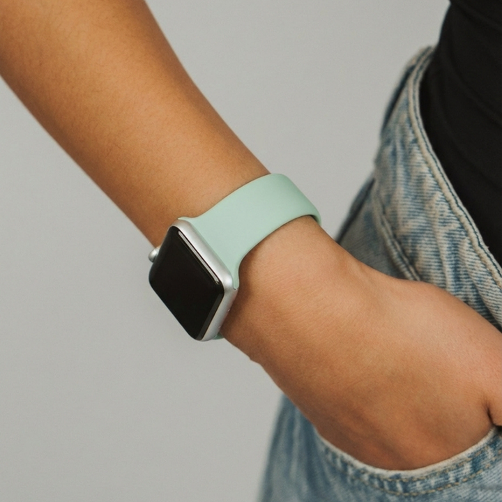 Hand in pocket with NAKD Watch Strap Cool Mint on the wrist