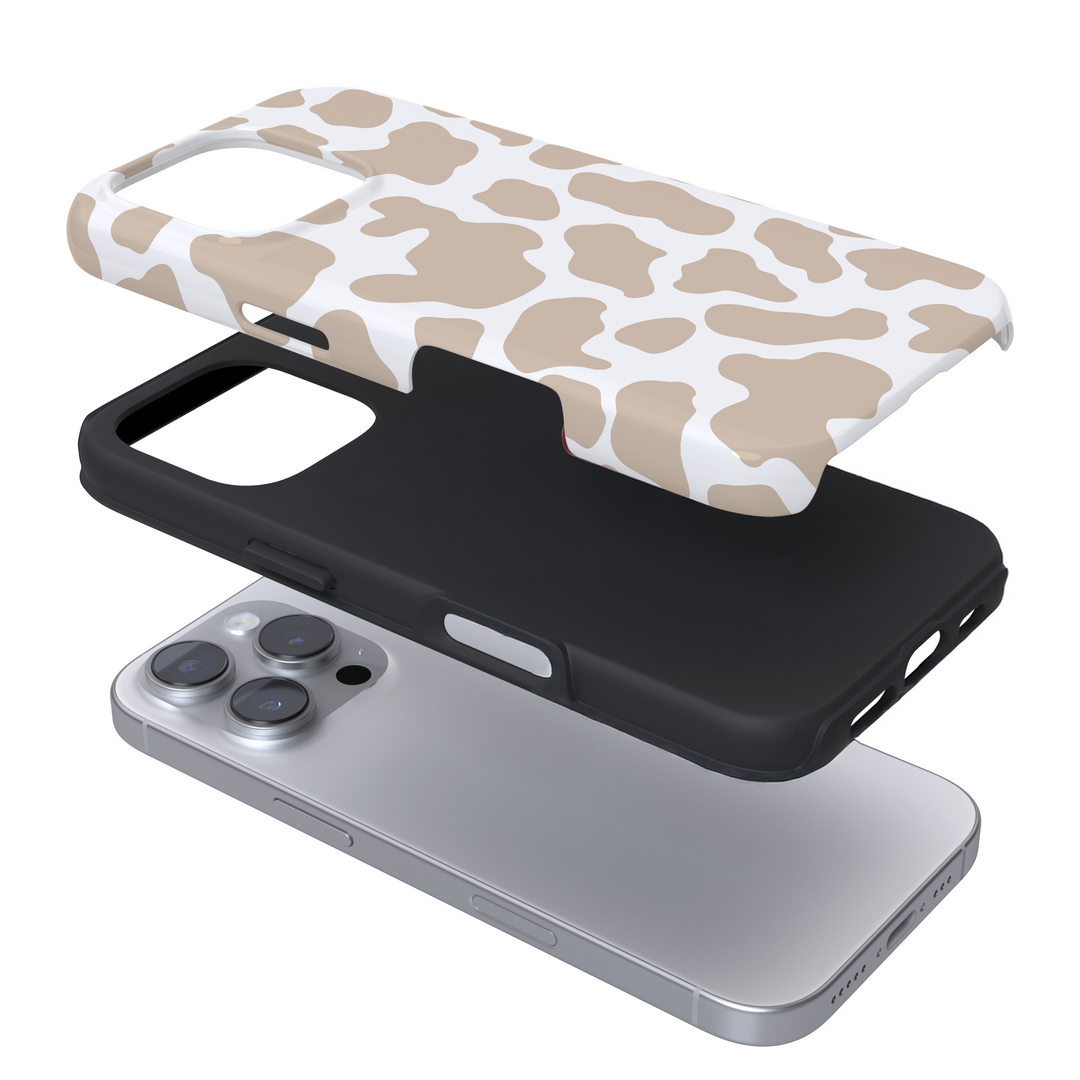 Expanded view of a phone case with a nude cow print on a white background