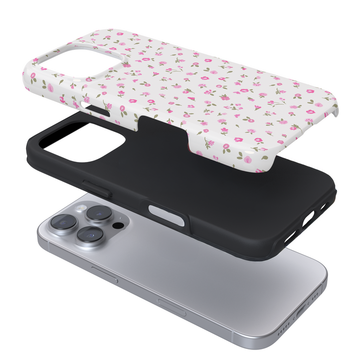 Expanded view of a phone case with a pink  floral pattern on a white background