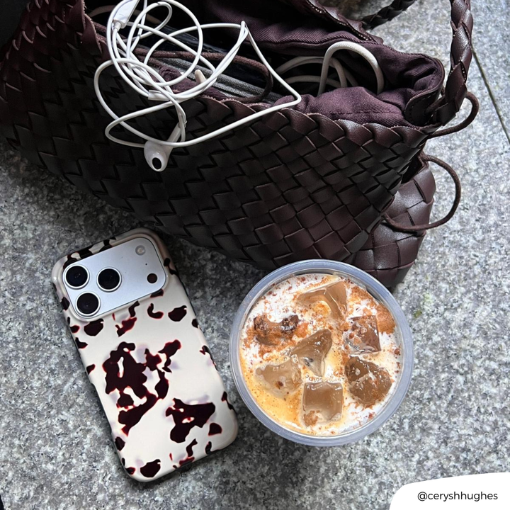 Ivory Tort iPhone 17 Phone Case on floor aesthetic flatlay picture