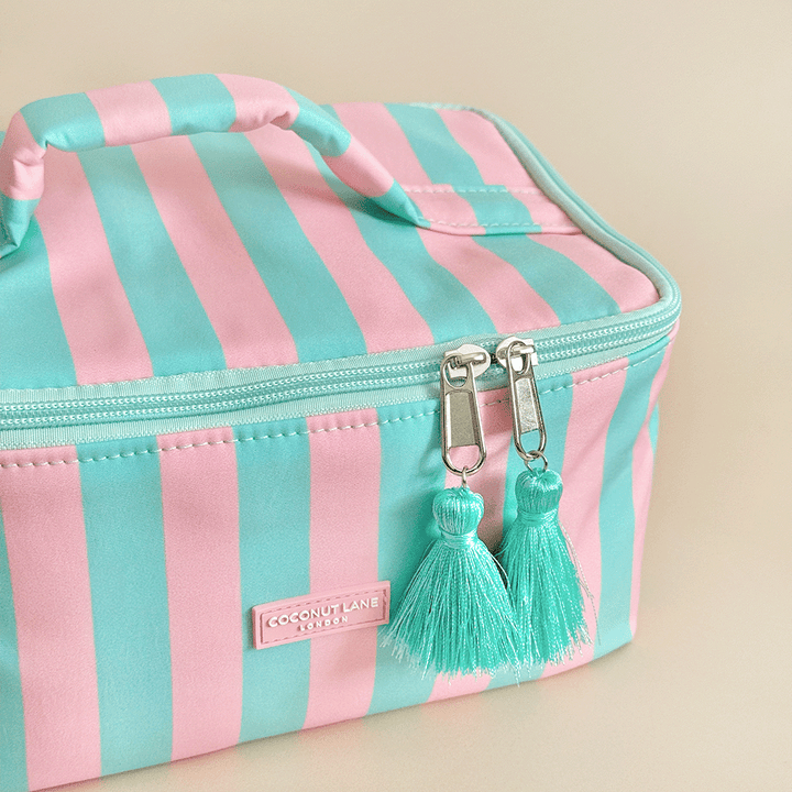 Blue and pink stripe Vanity Case, with tassels and padded handle.