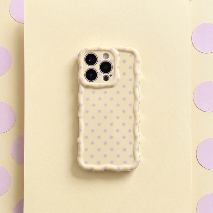 Pale yellow Wavy Phone Case with baby pink polka dots. Designed for iPhone.
