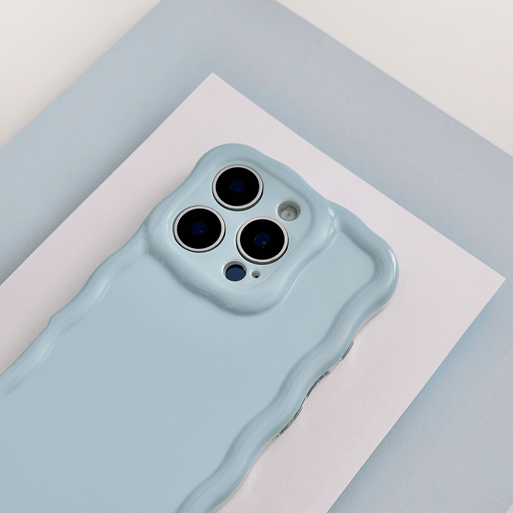 Plain baby blue coloured Phone Case with wavy edge effect.