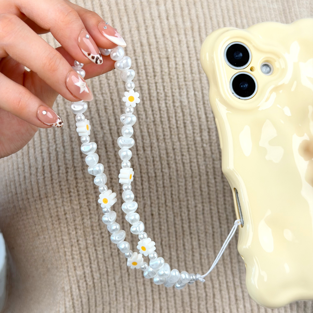 Daisy Pearl Phone Strap attached to 3D Bubble Butter Yellow Phone Case