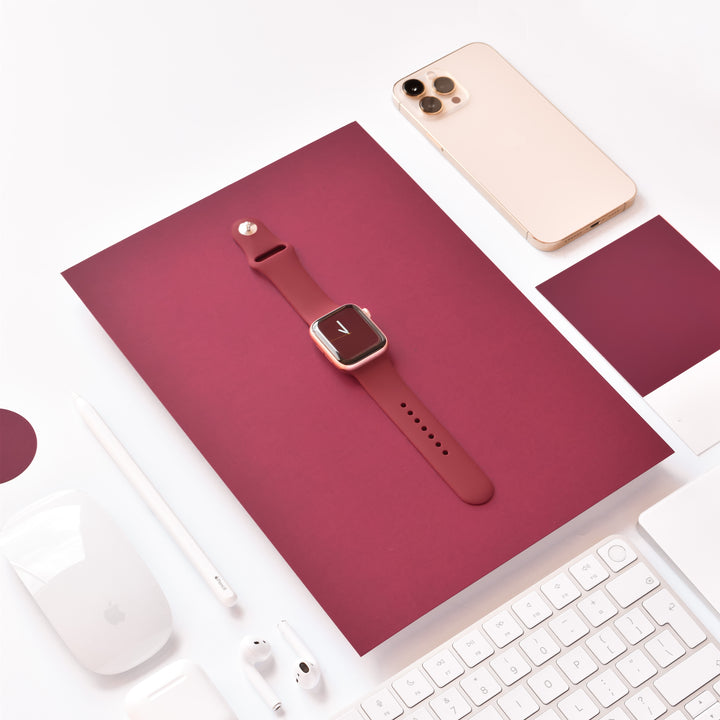 wine-purple-apple-watch-strap-surrounded-by-apple-technology