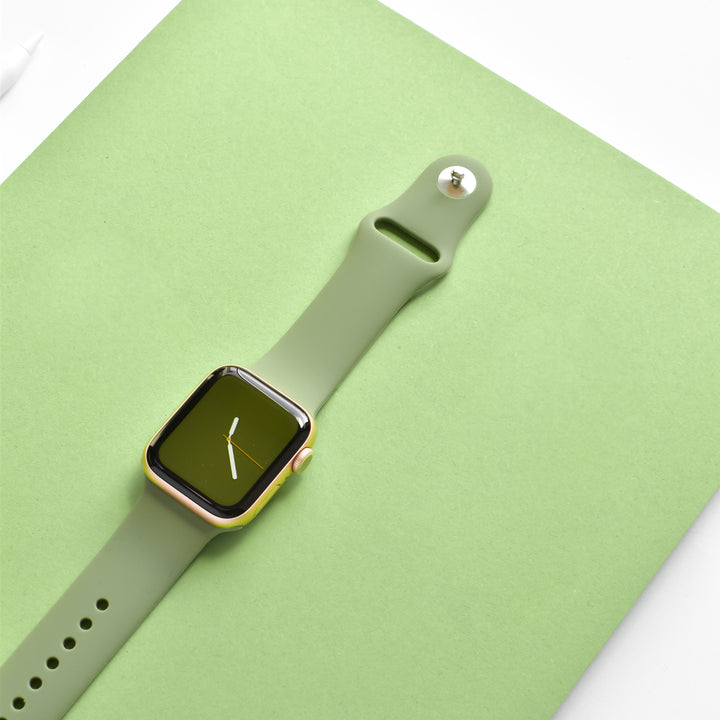 orange-apple-watch-strap-on-gold-apple-watch