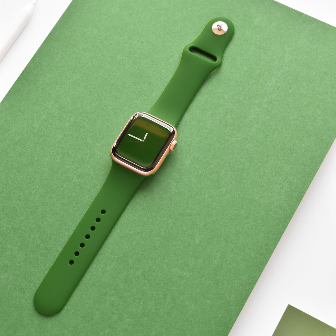 Green-apple-watch-strap-on-gold-apple-watch